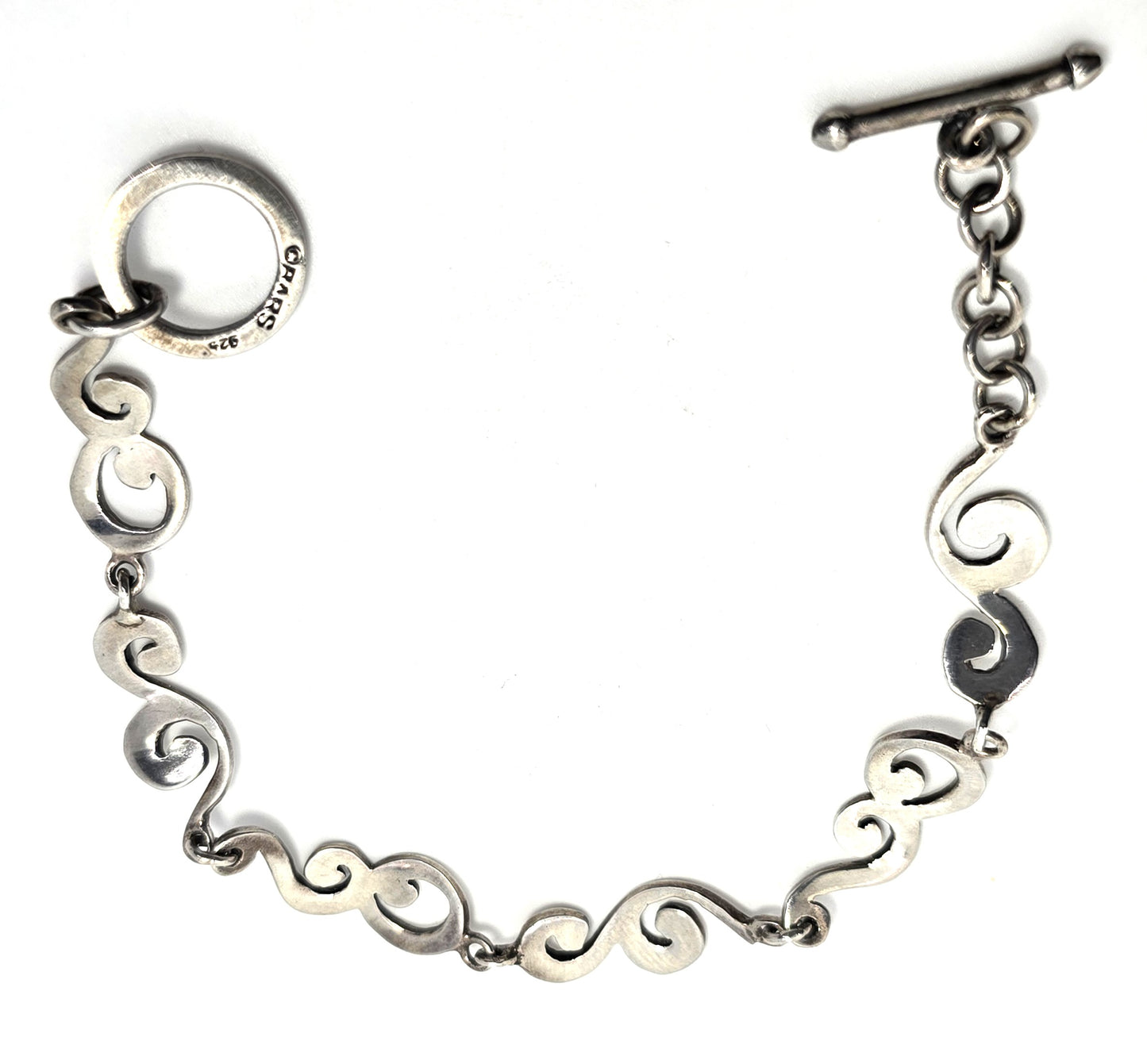Barse Filigree swirl linked panel signed toggle tennis bracelet