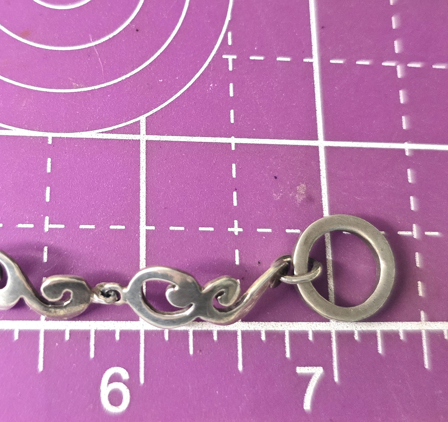 Barse Filigree swirl linked panel signed toggle tennis bracelet