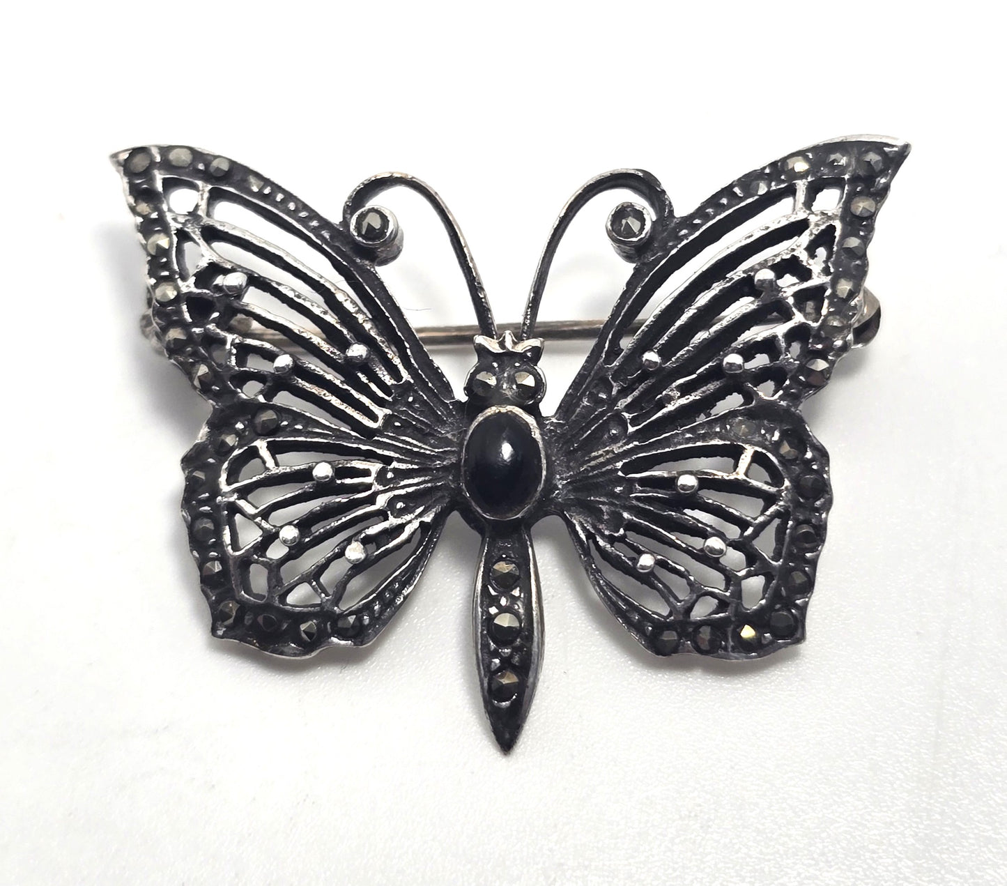Butterfly black onyx and marcasite sterling silver filigree brooch