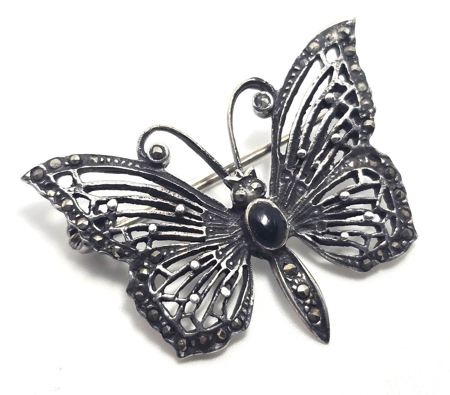Butterfly black onyx and marcasite sterling silver filigree brooch