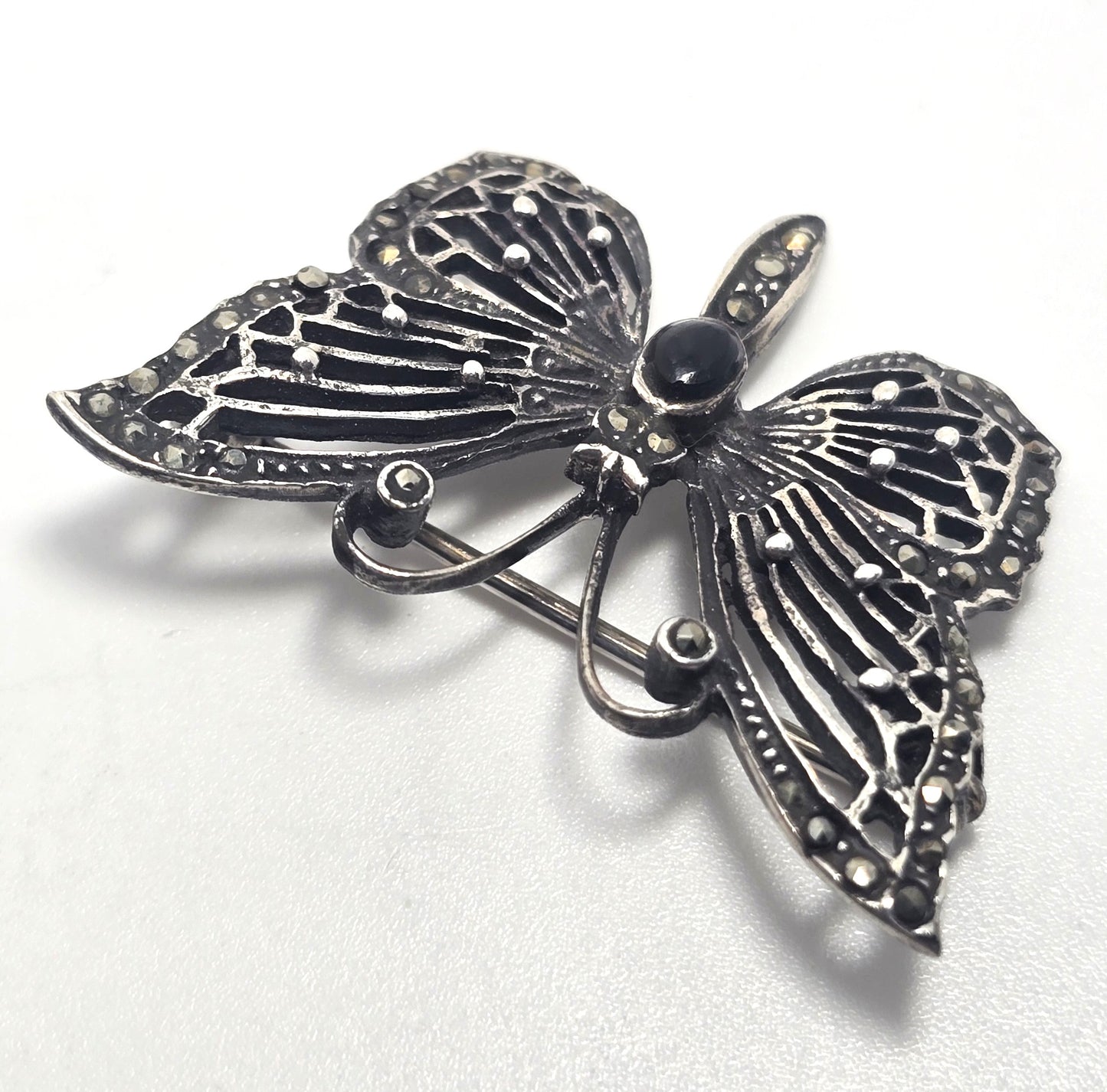 Butterfly black onyx and marcasite sterling silver filigree brooch