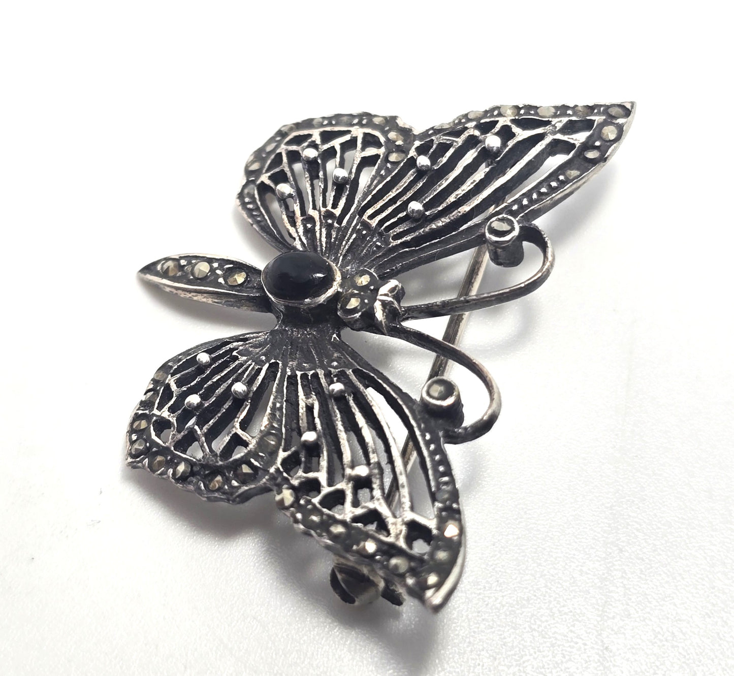 Butterfly black onyx and marcasite sterling silver filigree brooch