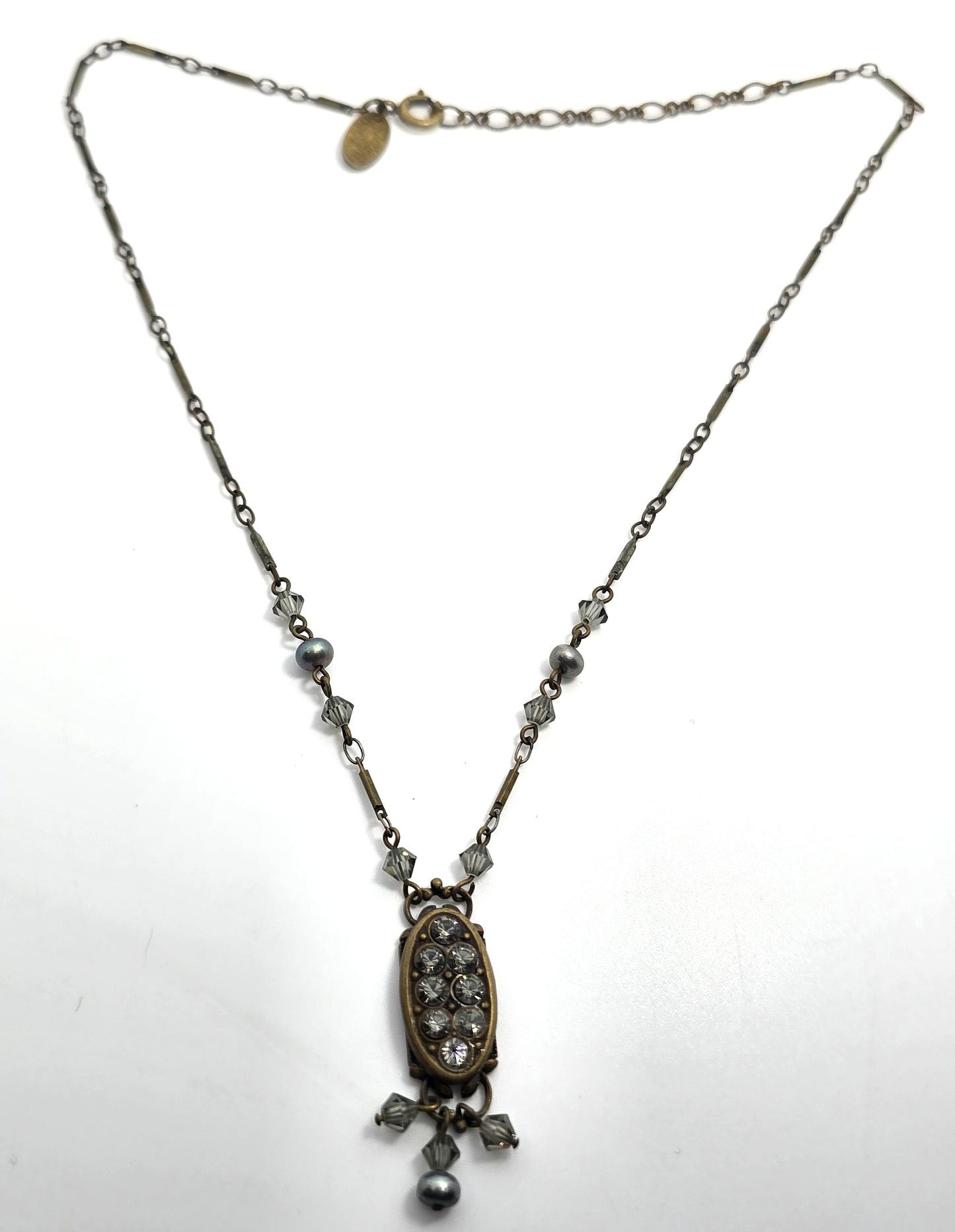 Liz Palacios necklace oval bronze pendant adorned with rhinestone accents