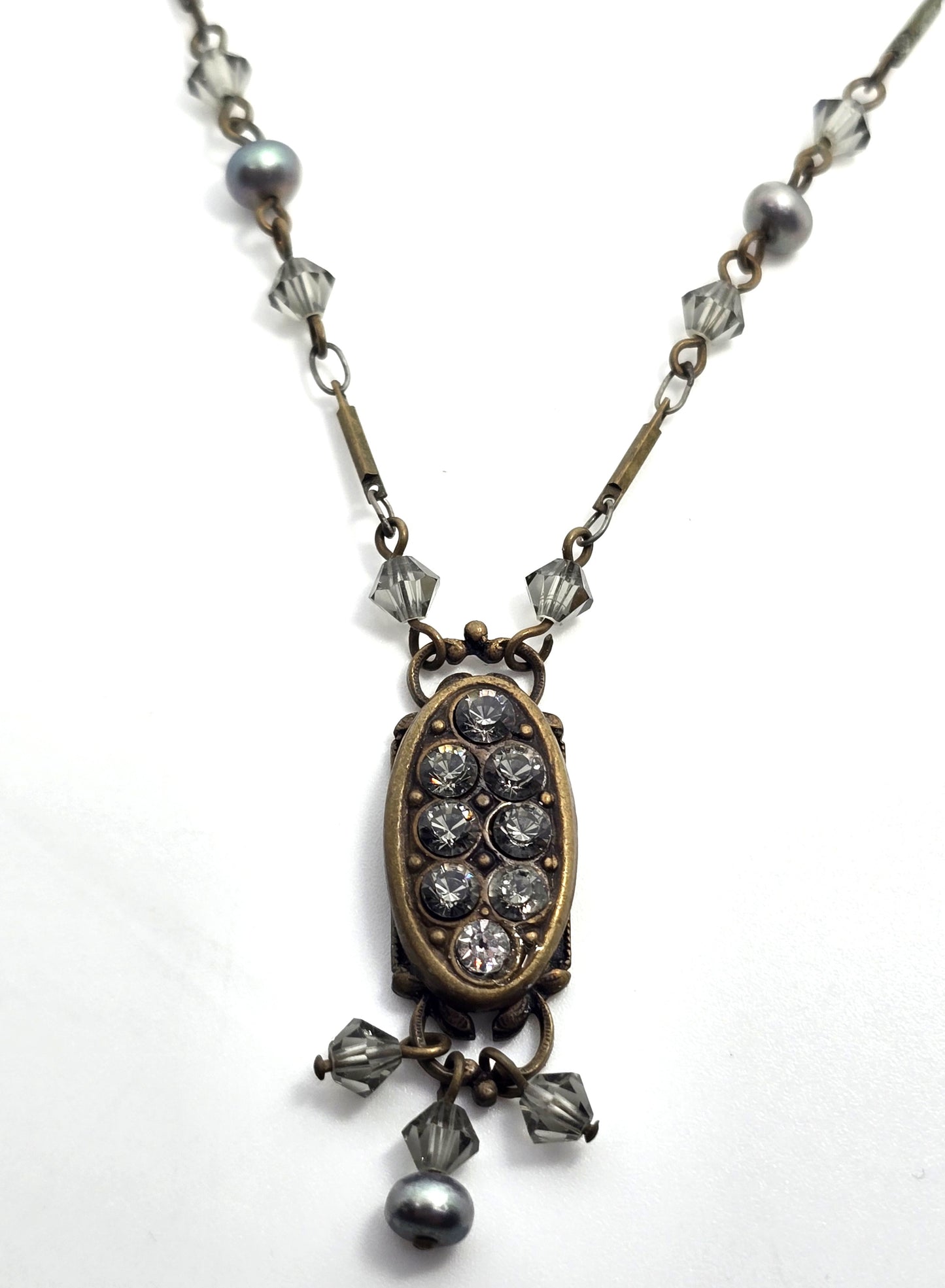 Liz Palacios necklace oval bronze pendant adorned with rhinestone accents