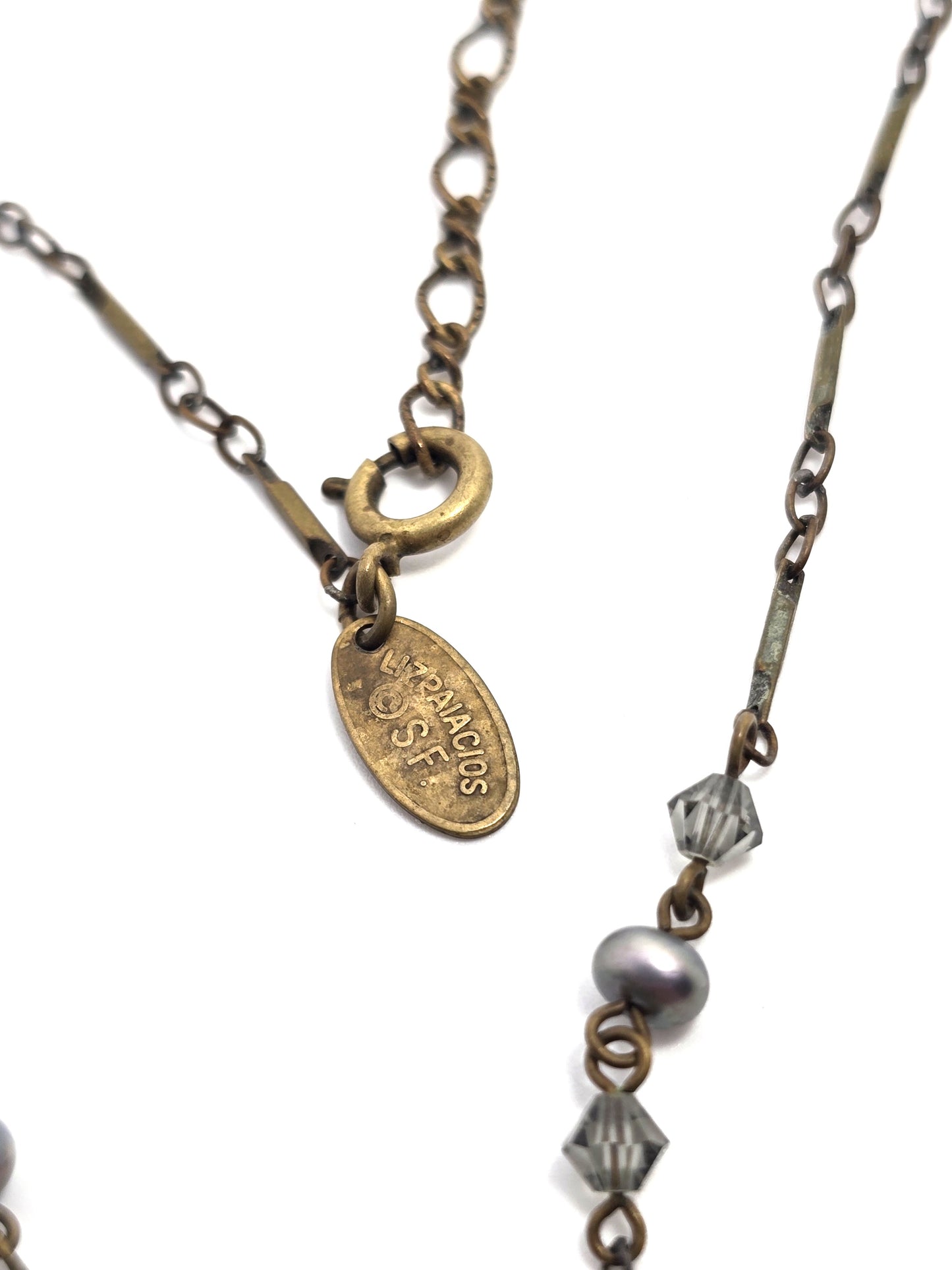 Liz Palacios necklace oval bronze pendant adorned with rhinestone accents