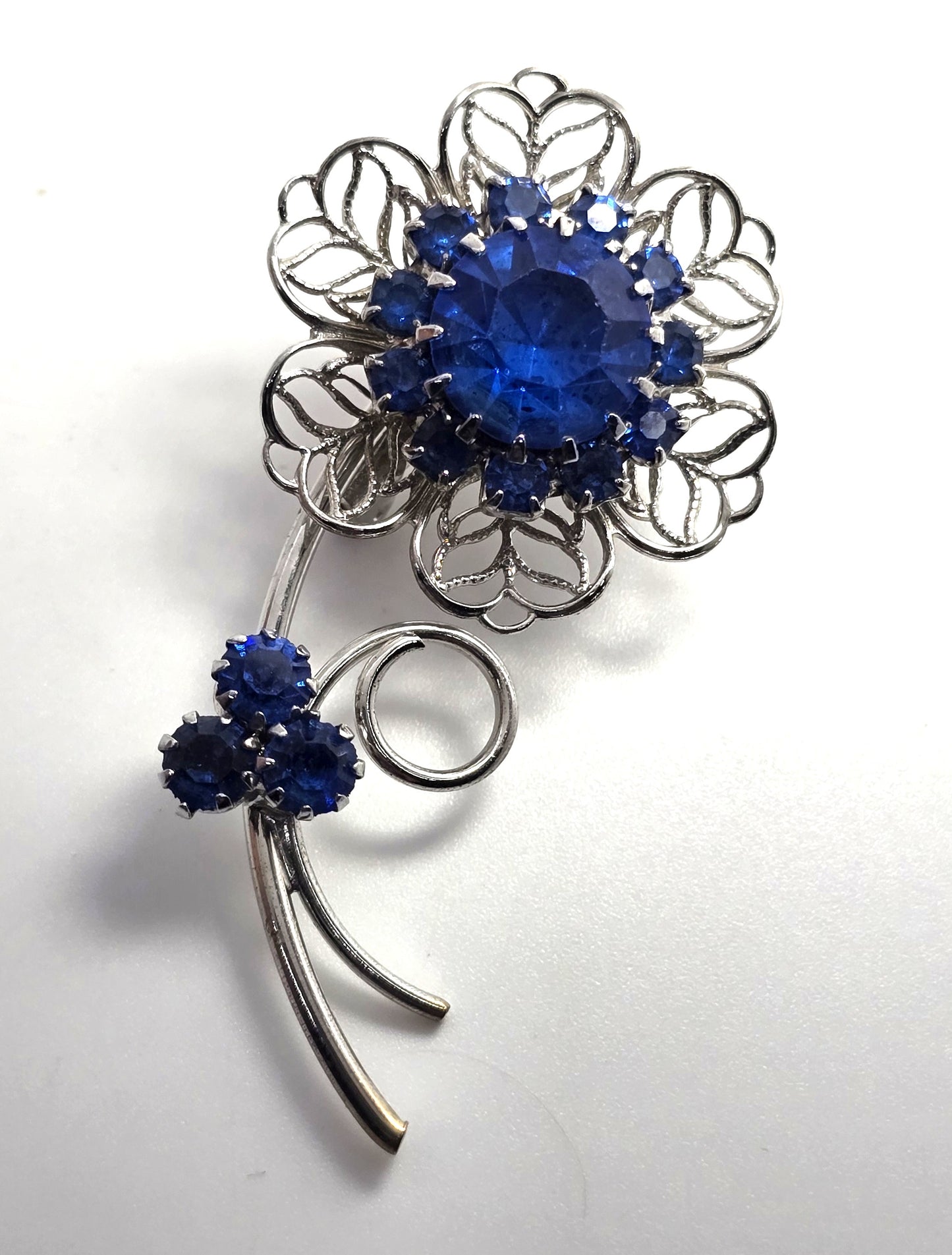 Bright blue rhinestone flower mid century MCM vintage spray brooch