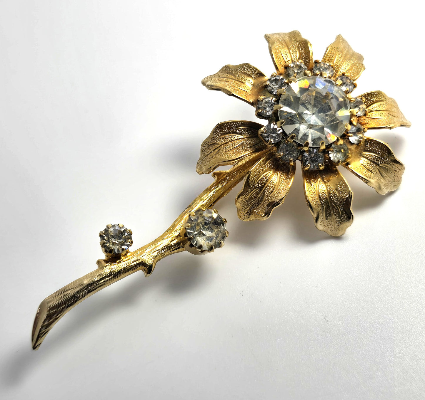 Golden blooming sparkling flower rhinestone vintage brooch