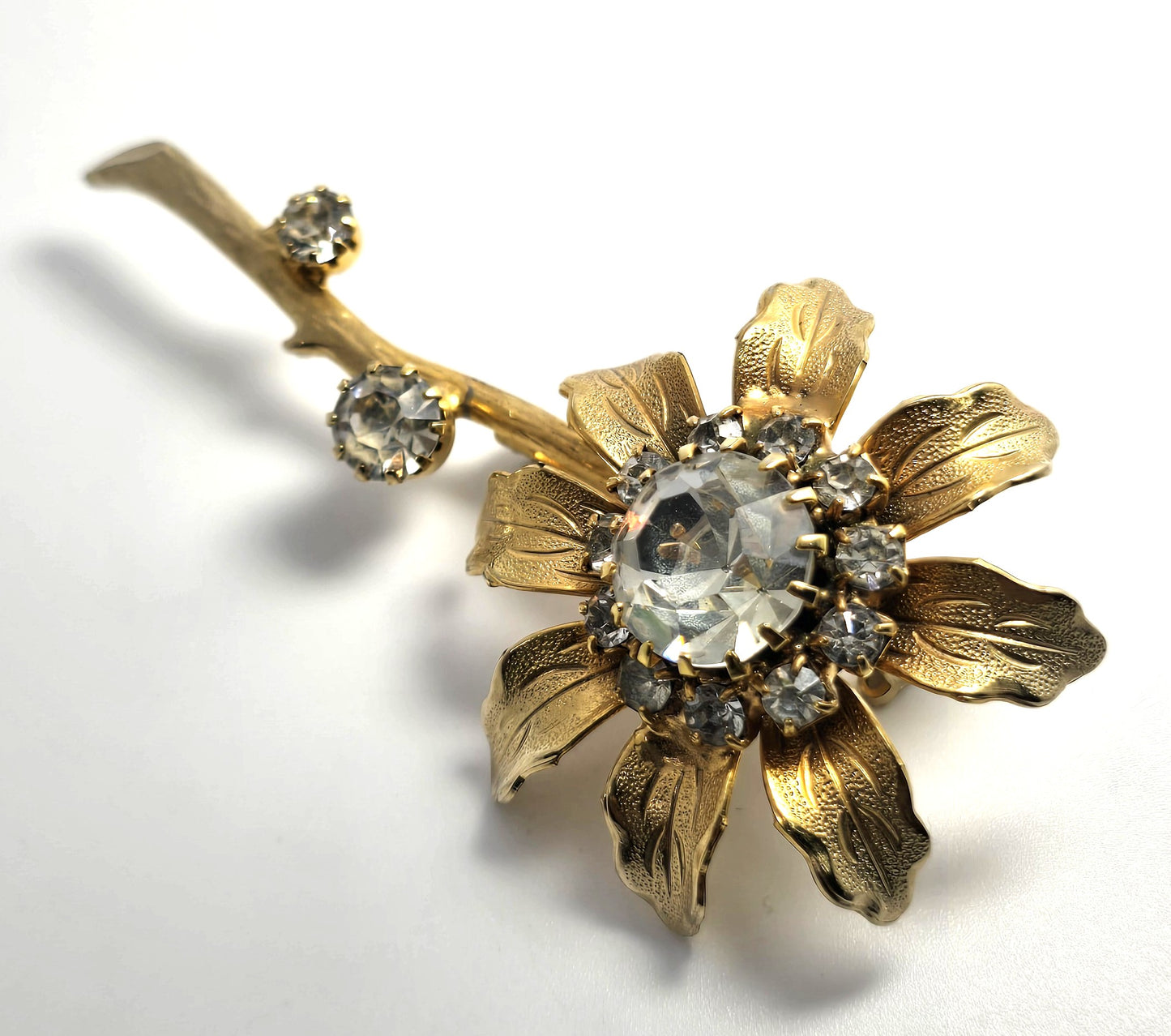 Golden blooming sparkling flower rhinestone vintage brooch