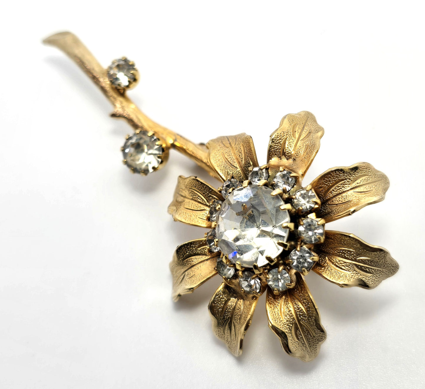 Golden blooming sparkling flower rhinestone vintage brooch