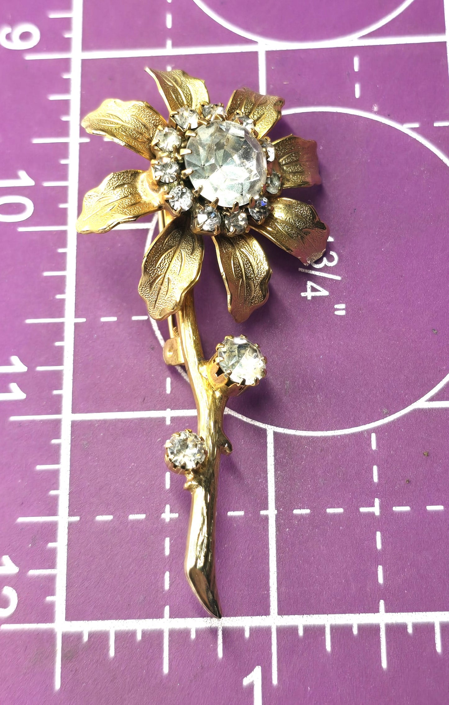 Golden blooming sparkling flower rhinestone vintage brooch