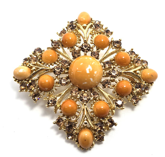 Weiss orange domed cabochon vintage gold toned rhinestone brooch
