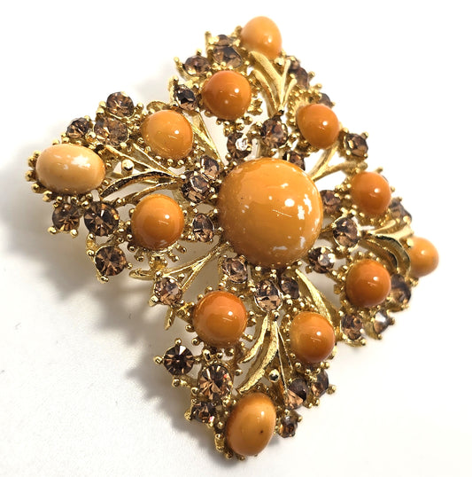 Weiss orange domed cabochon vintage gold toned rhinestone brooch