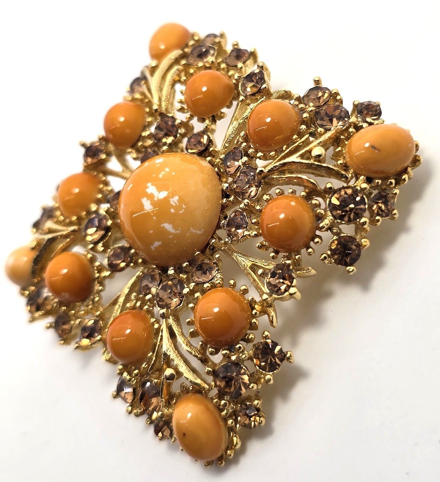 Weiss orange domed cabochon vintage gold toned rhinestone brooch