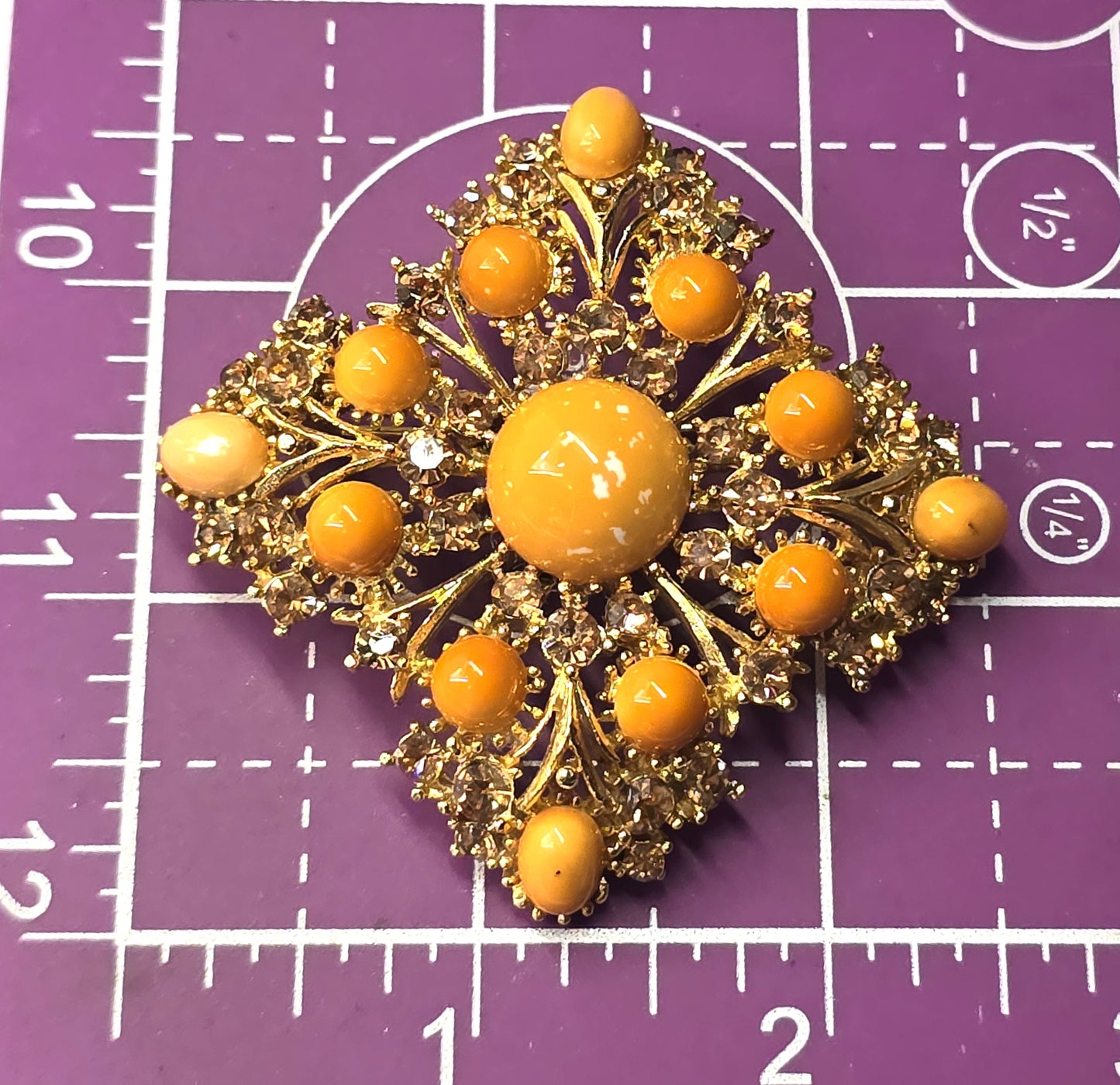 Weiss orange domed cabochon vintage gold toned rhinestone brooch
