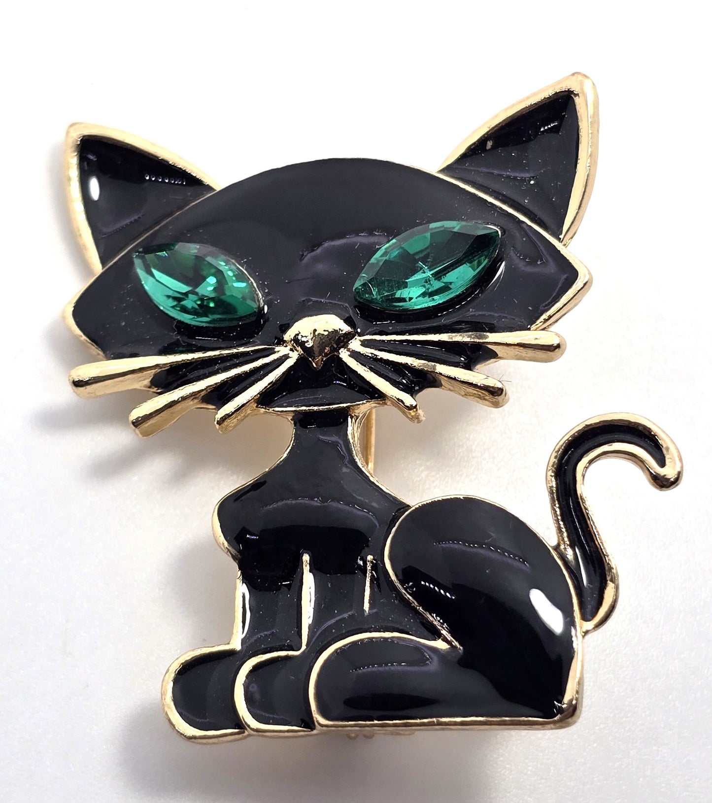 Black enamel retro sassy kitty cat green rhinestone eyes vintage brooch