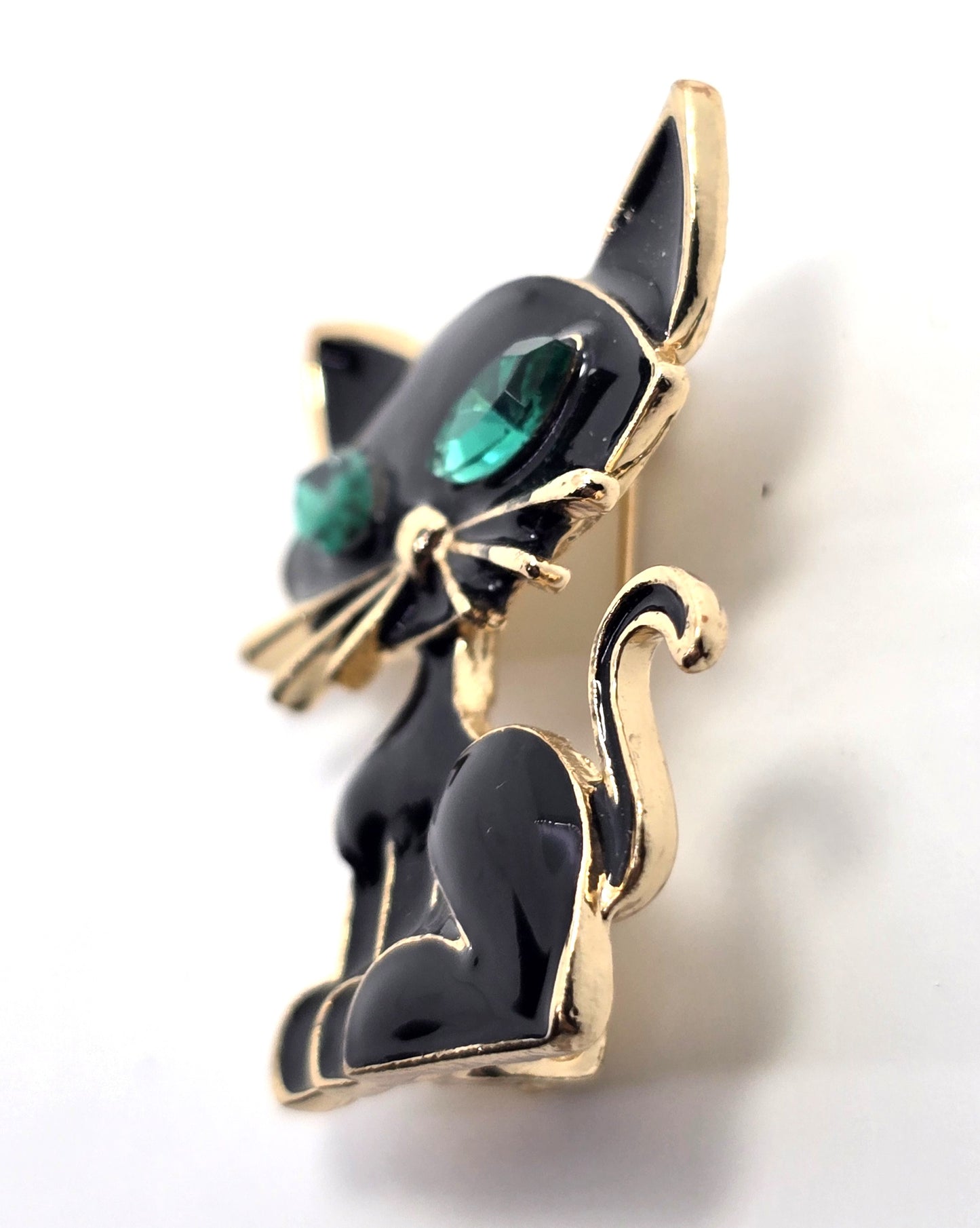Black enamel retro sassy kitty cat green rhinestone eyes vintage brooch