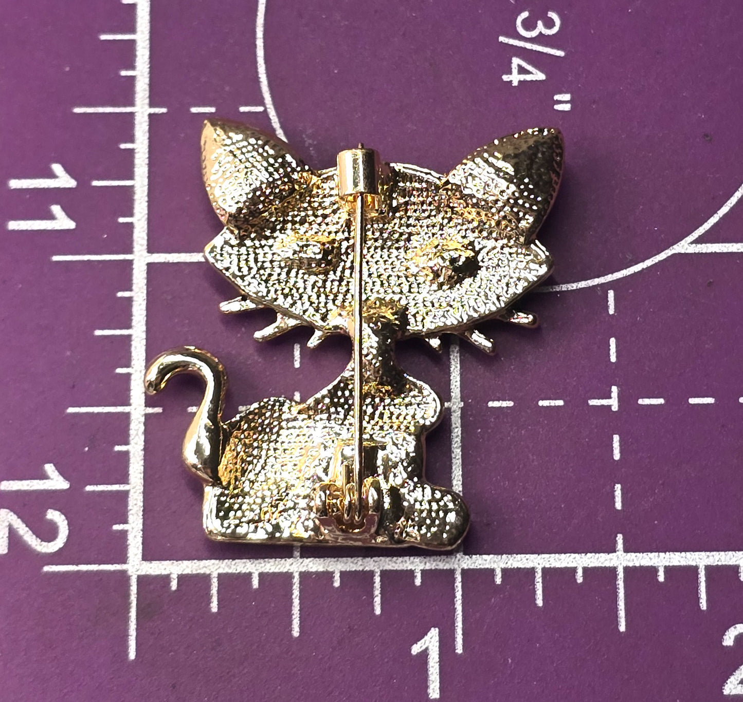 Black enamel retro sassy kitty cat green rhinestone eyes vintage brooch