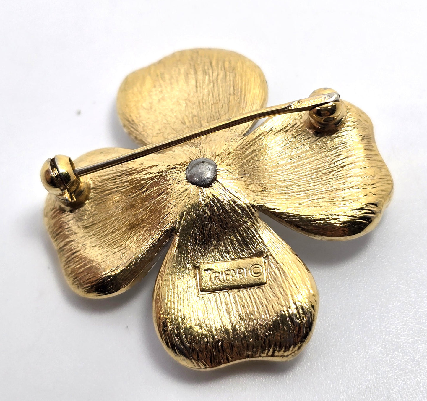 Trifari vintage brushed white Dogwood Flower gold toned signed brooch
