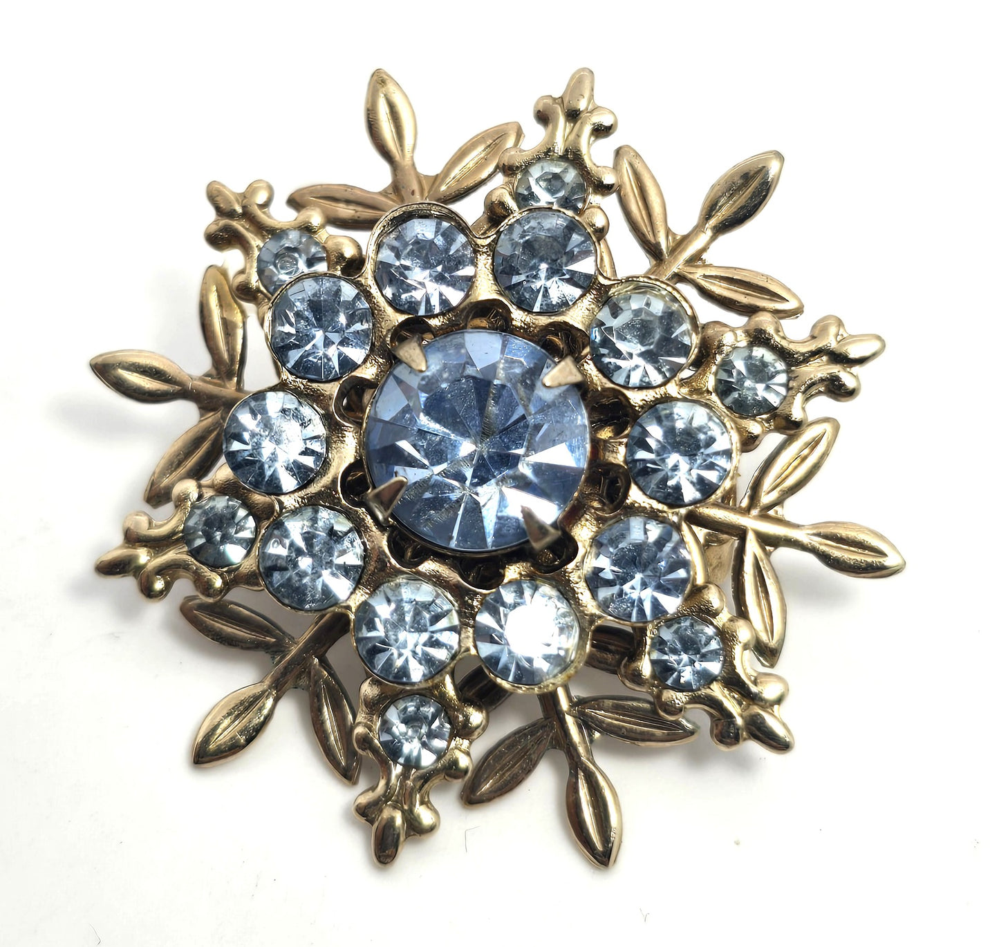 Baby blue gold toned snowflake winter vintage rhinestone brooch