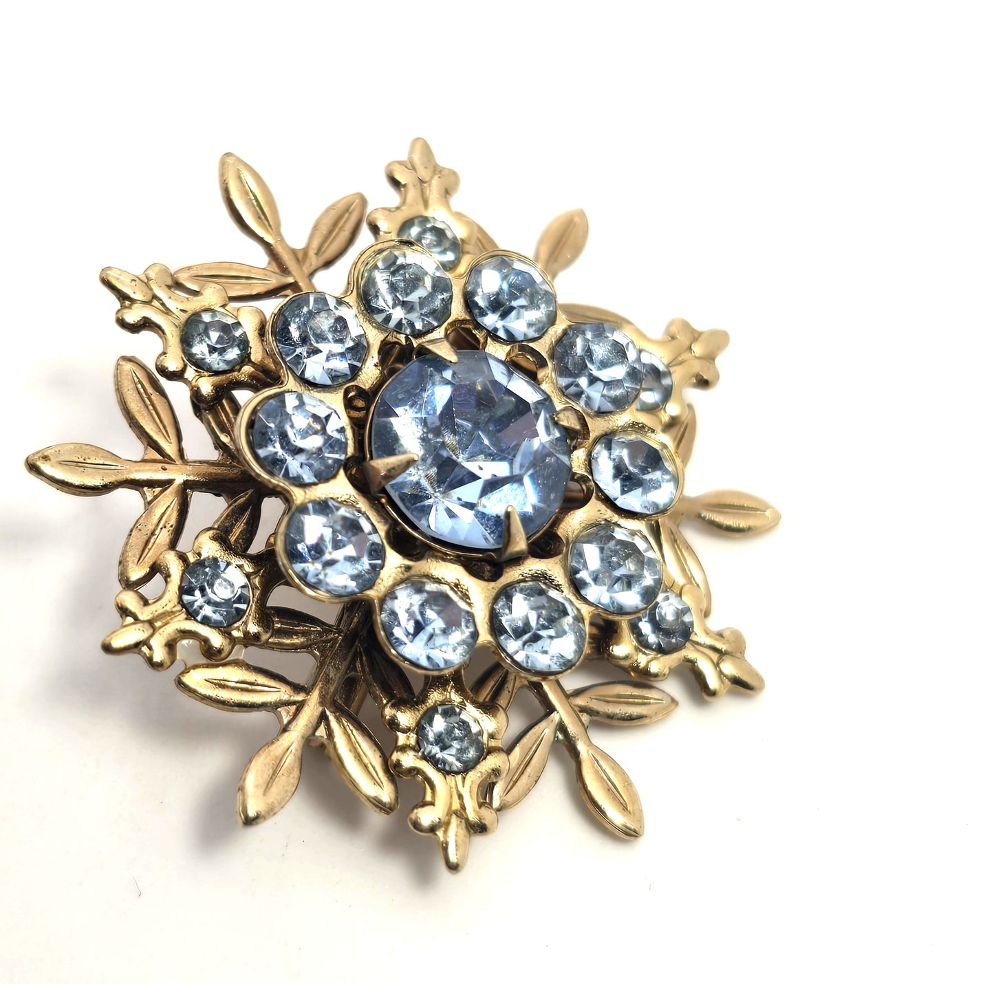 Baby blue gold toned snowflake winter vintage rhinestone brooch