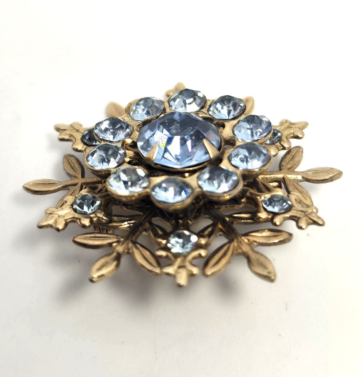 Baby blue gold toned snowflake winter vintage rhinestone brooch