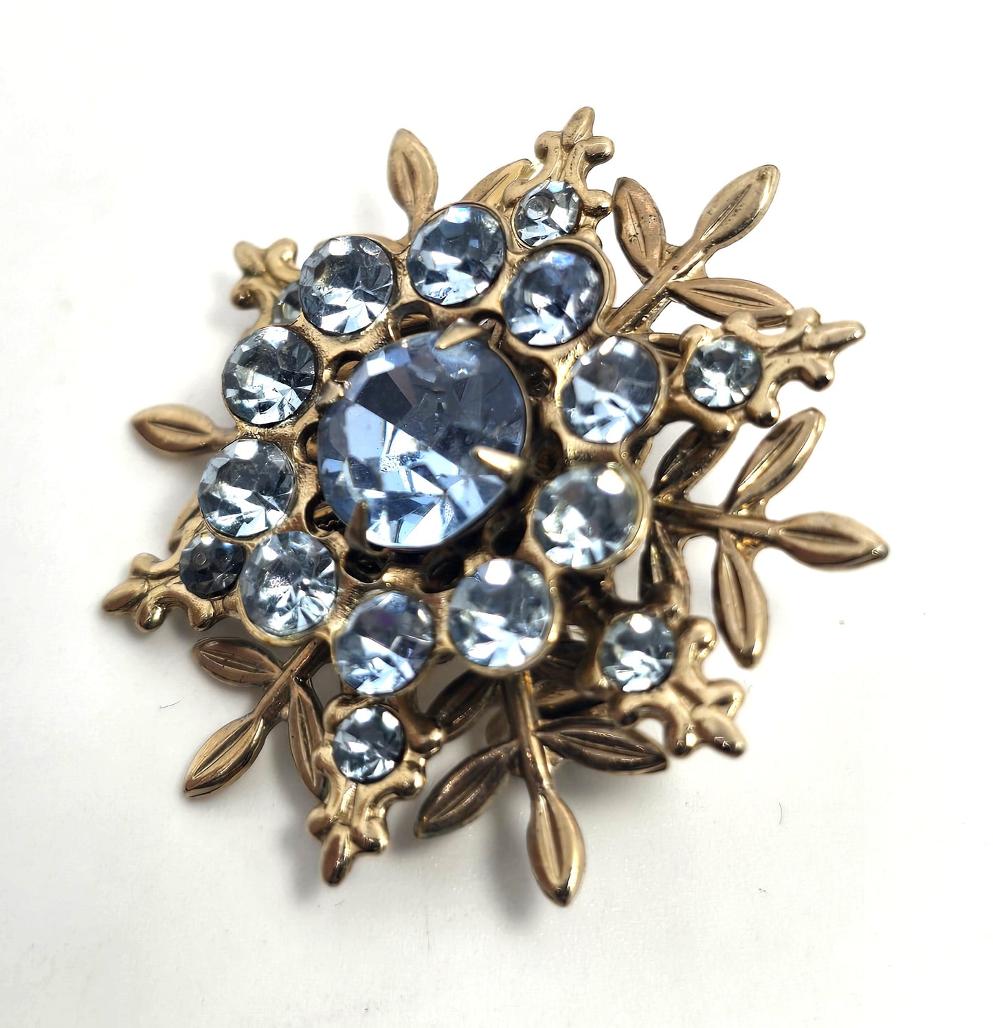Baby blue gold toned snowflake winter vintage rhinestone brooch