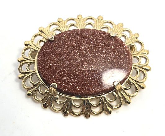 Victorian Revival Goldstone glass stamped brass vintage brooch pin