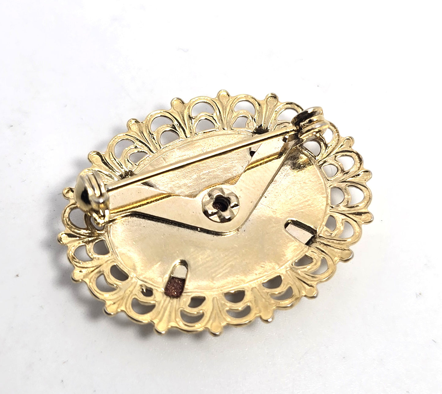 Victorian Revival Goldstone glass stamped brass vintage brooch pin