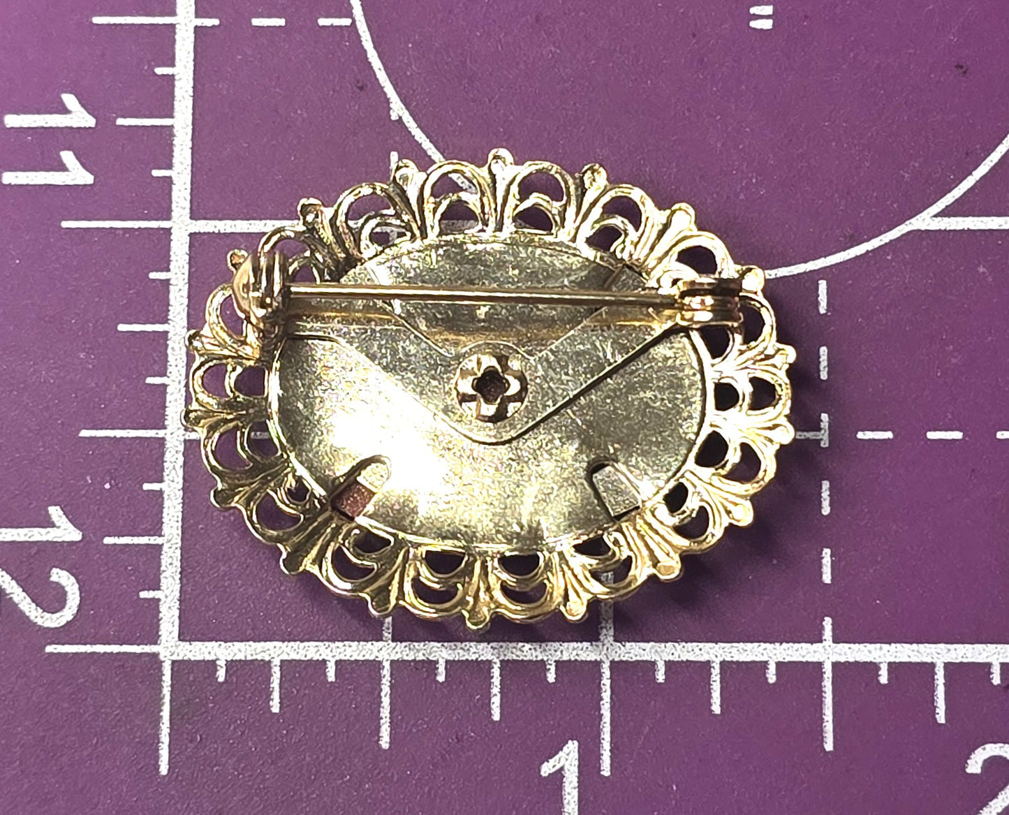 Victorian Revival Goldstone glass stamped brass vintage brooch pin