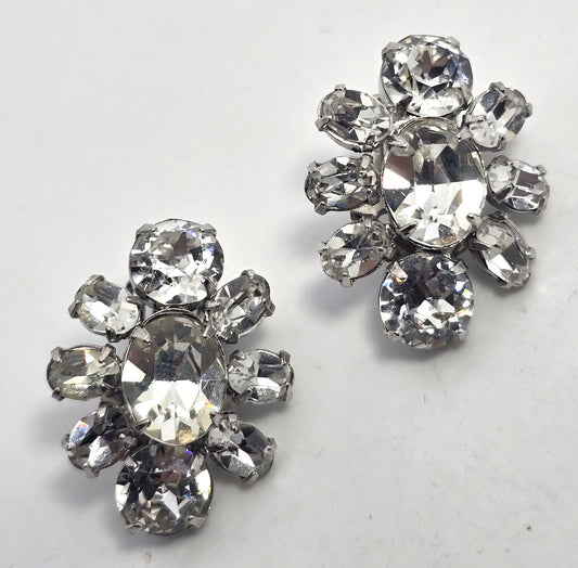 Bright vintage clear rhinestone silver toned cluster clip on earrings mid century