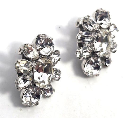 Bright vintage clear rhinestone silver toned cluster clip on earrings mid century