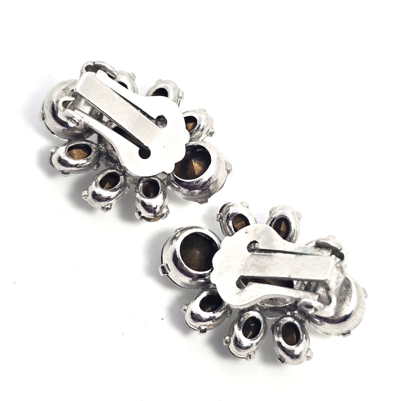 Bright vintage clear rhinestone silver toned cluster clip on earrings mid century