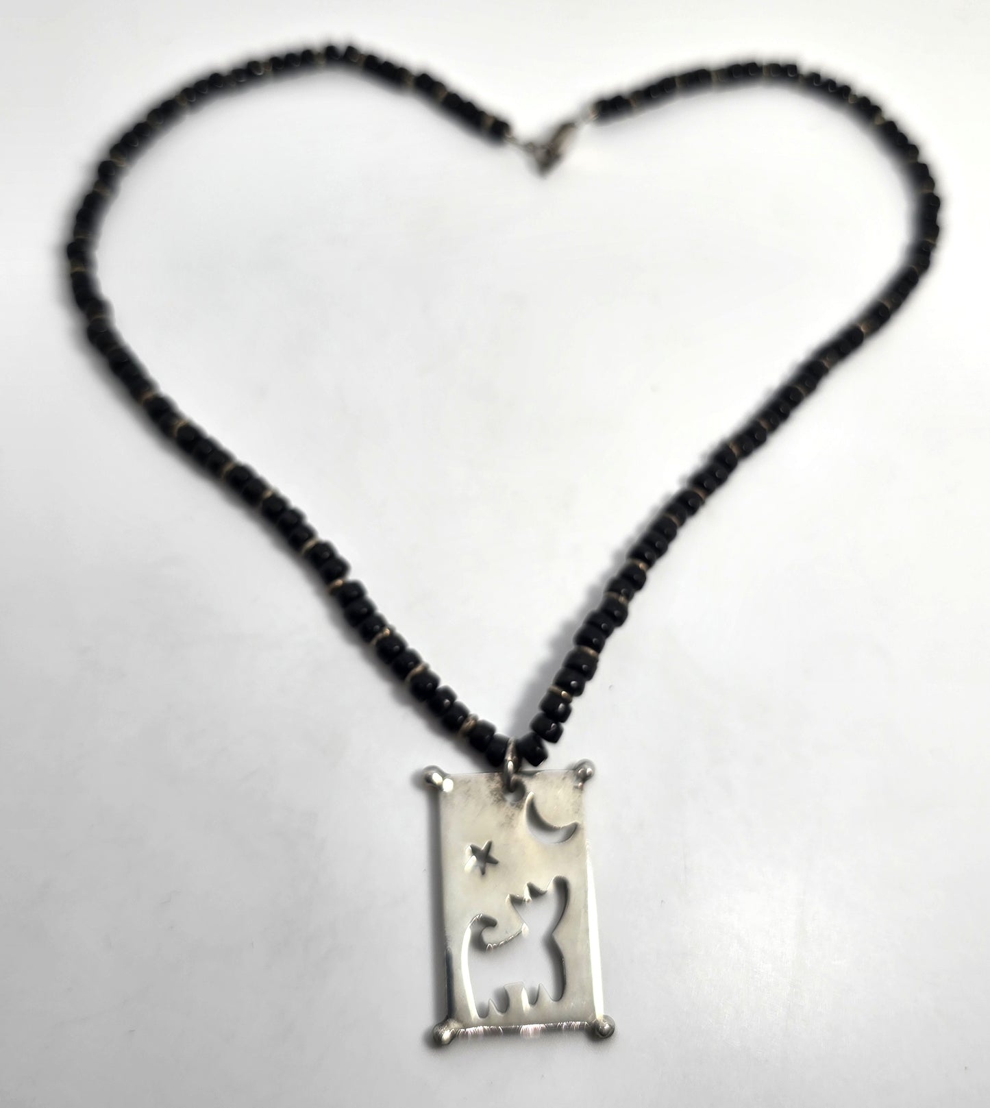 Wolf howling at the moon black seed bead artisan sterling silver necklace