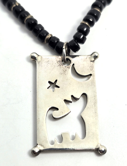 Wolf howling at the moon black seed bead artisan sterling silver necklace
