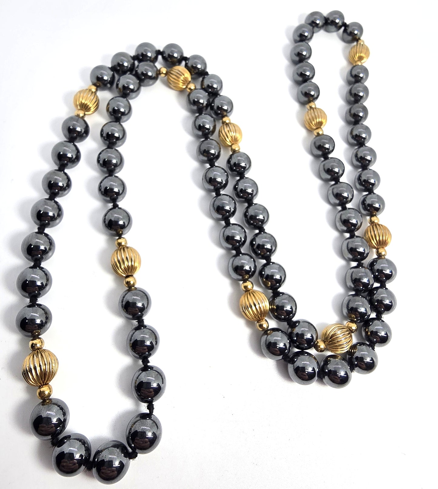 Hematite gold toned beaded long beaded 36 inch vintage necklace