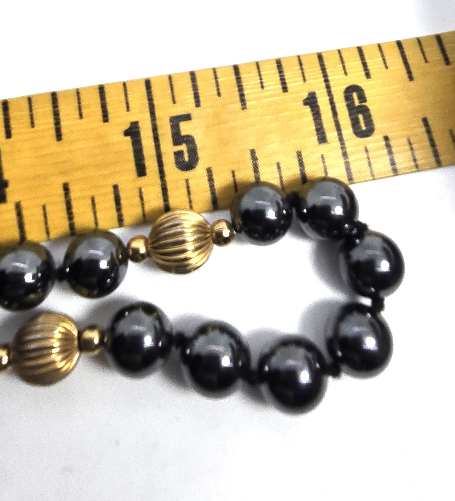 Hematite gold toned beaded long beaded 36 inch vintage necklace