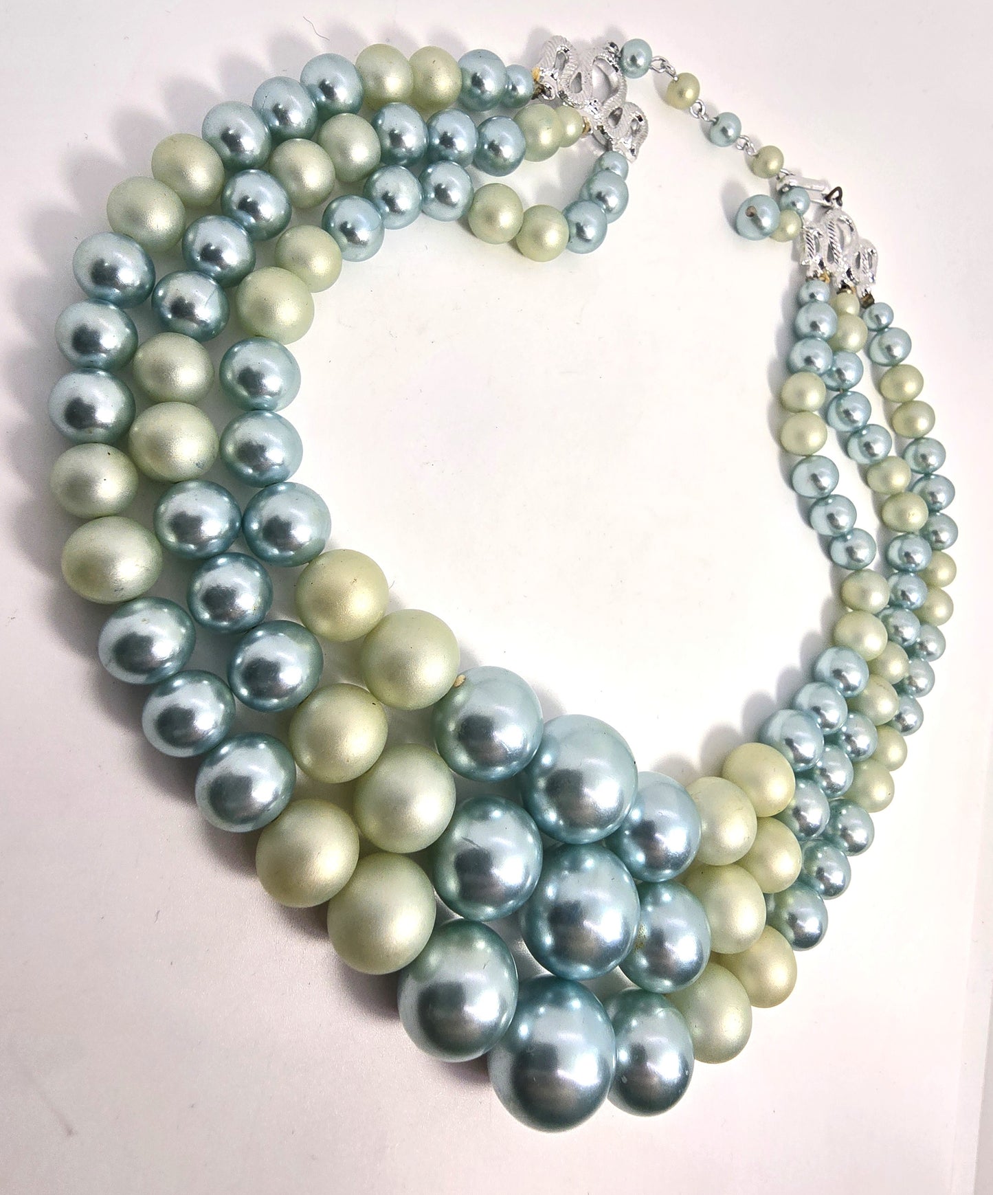 Baby blue pearlized and matte plastic beaded 3 stand vintage necklace