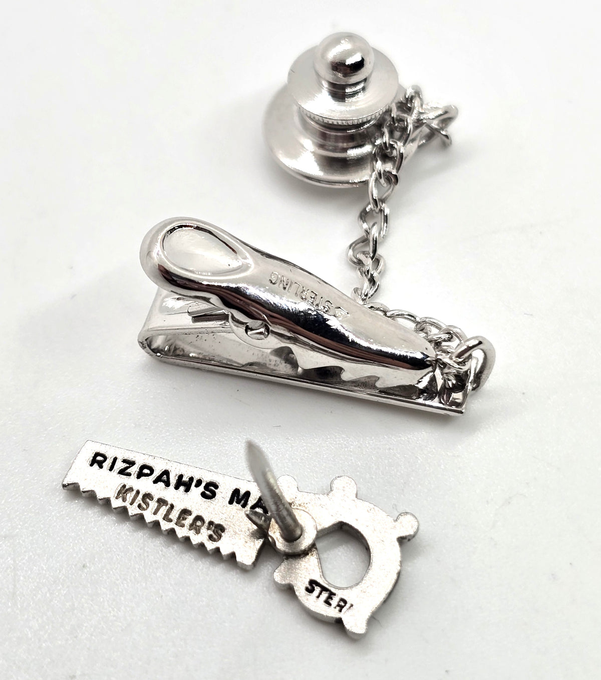 Rizpah's MA Kistler's sterling silver hand saw vintage tie tack