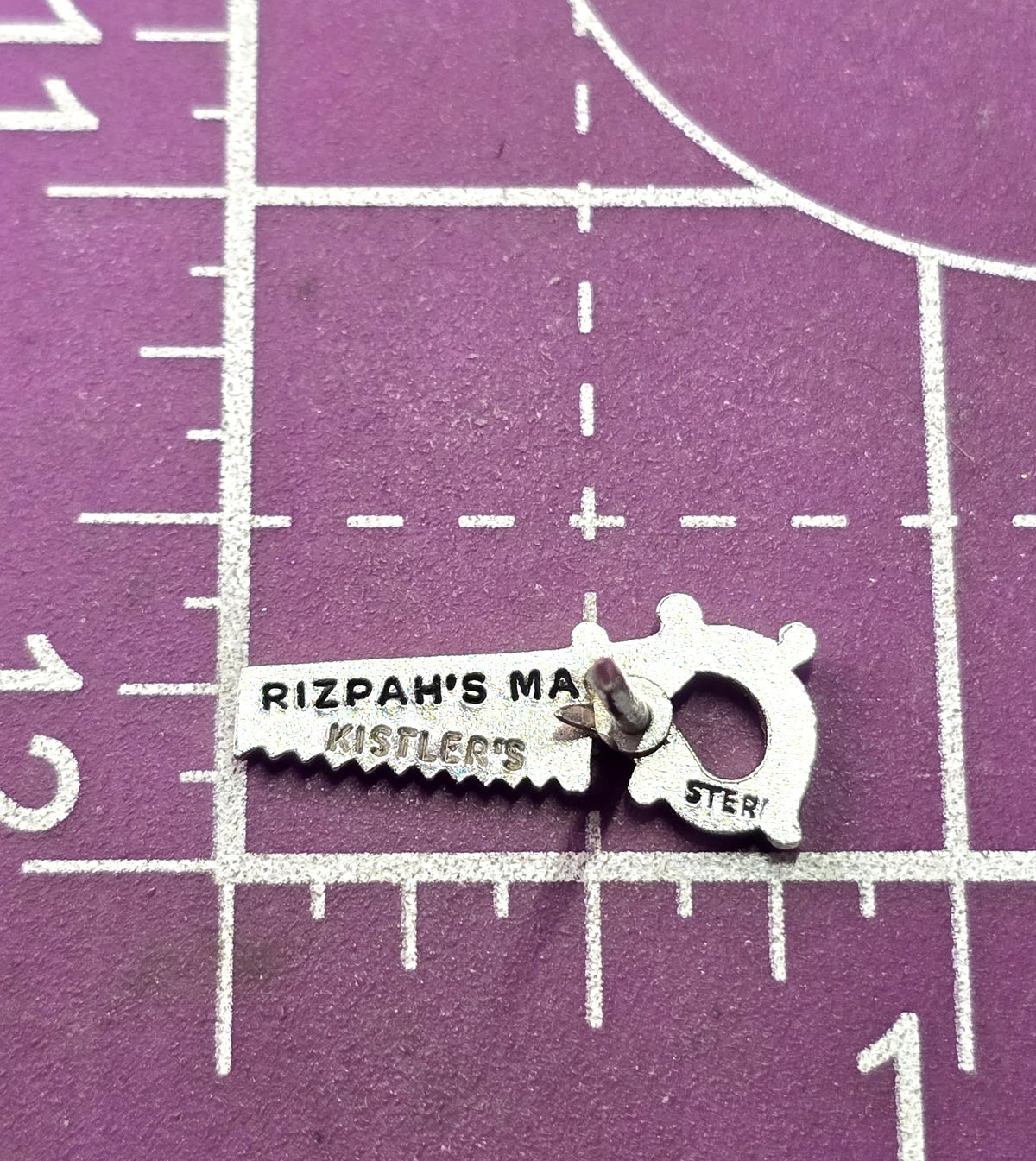Rizpah's MA Kistler's sterling silver hand saw vintage tie tack