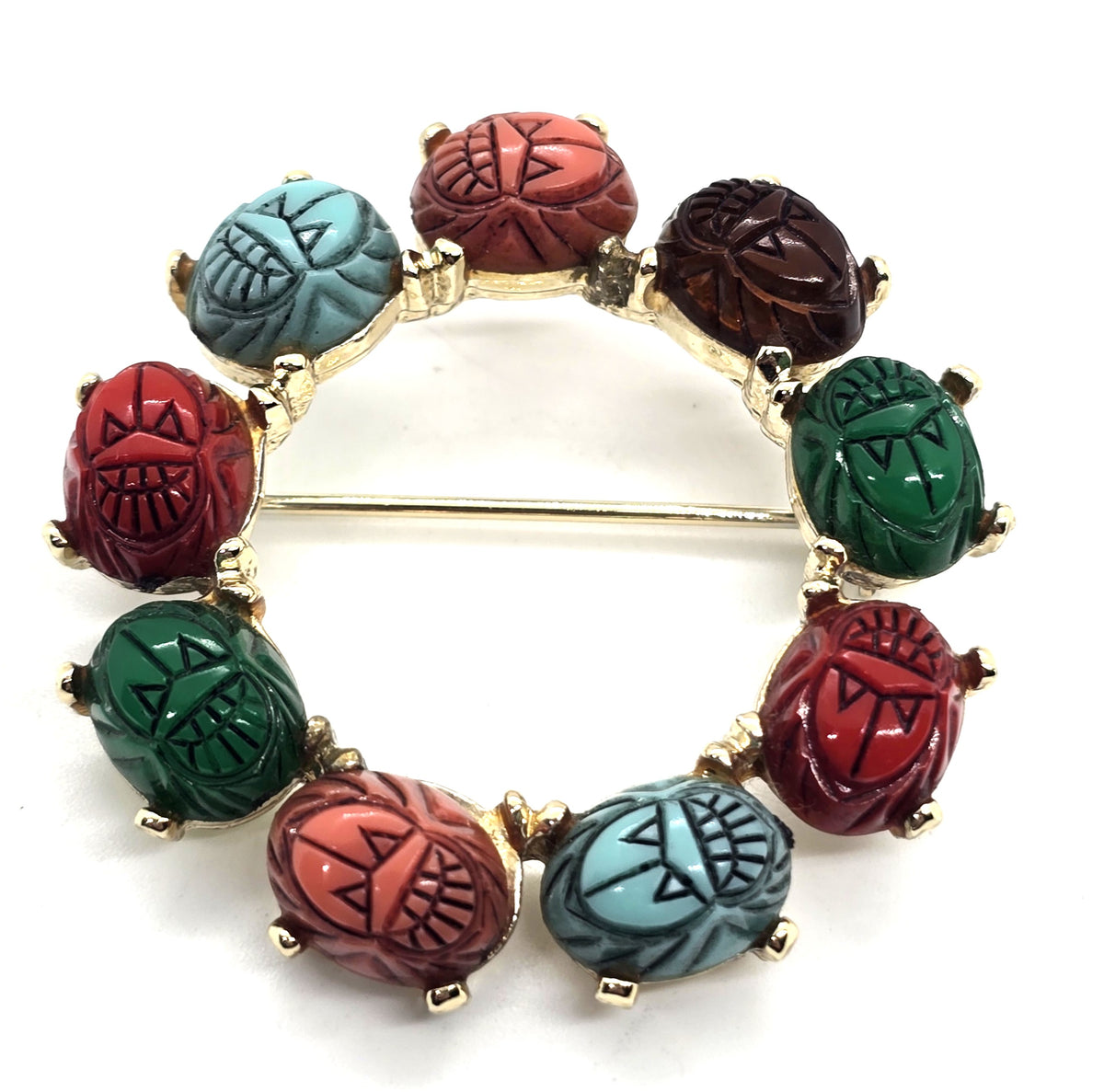 Egyptian Revival molded glass vintage scarab circle infinity brooch
