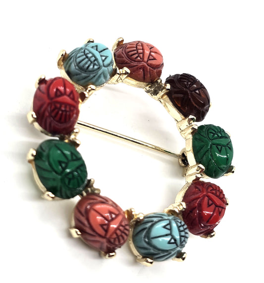 Egyptian Revival molded glass vintage scarab circle infinity brooch