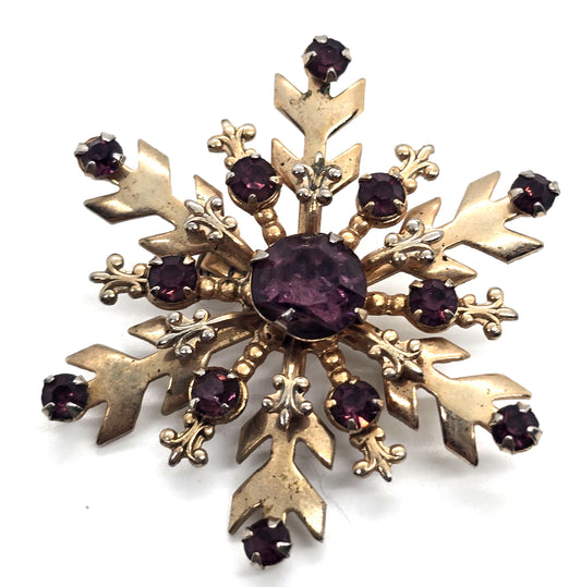 Mid Century Snowflake purple rhinestone gold toned vintage brooch
