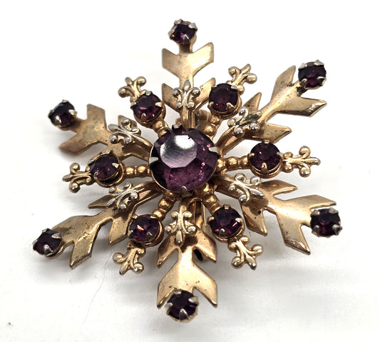 Mid Century Snowflake purple rhinestone gold toned vintage brooch
