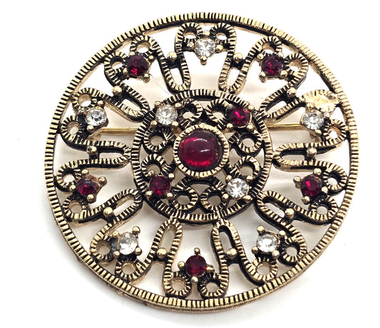 Red and white rhinestone mandala vintage mid century holiday circle brooch