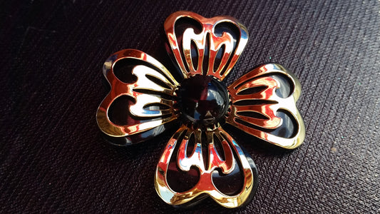 Black and gold layered tin flower brooch