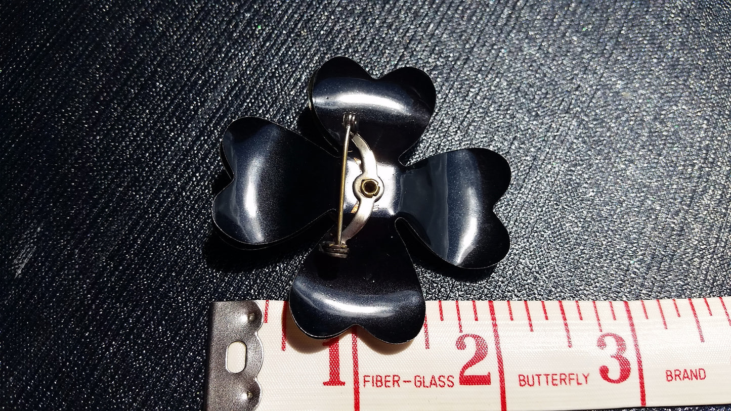 Black and gold layered tin flower brooch
