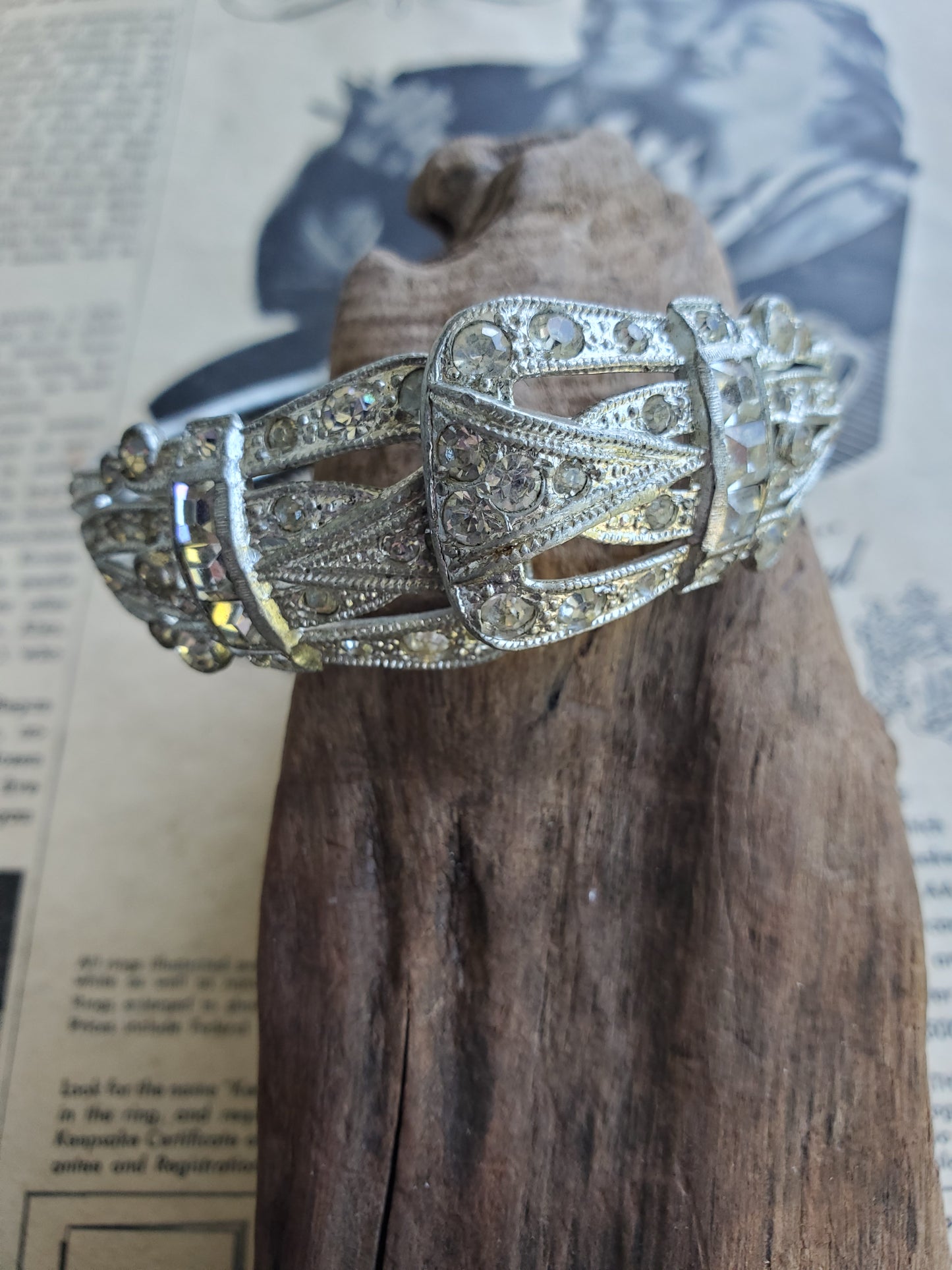 Art Deco pot metal pave set paste rhinestone clamper bracelet with Princess cut accents