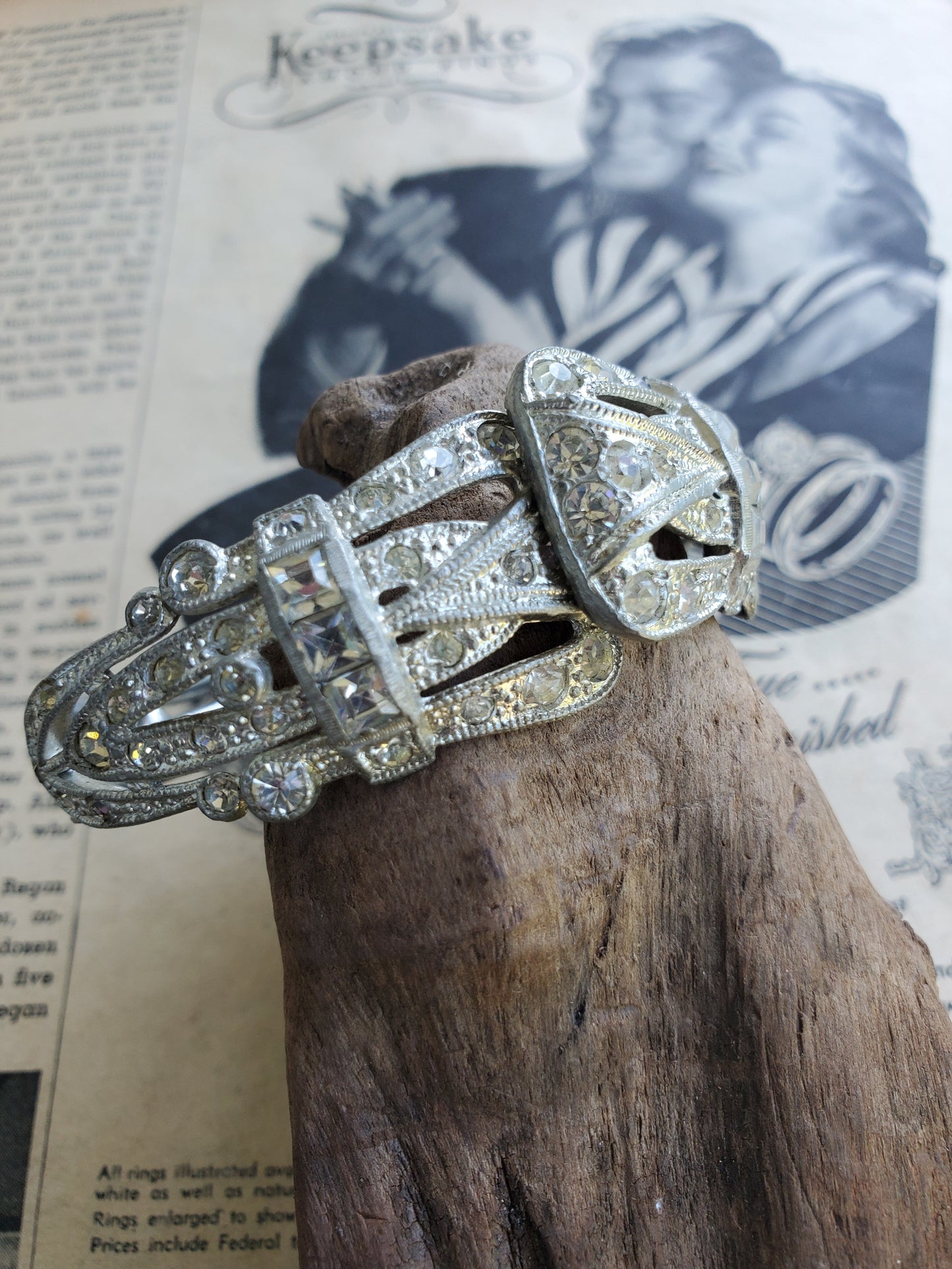 Art Deco pot metal pave set paste rhinestone clamper bracelet with Princess cut accents