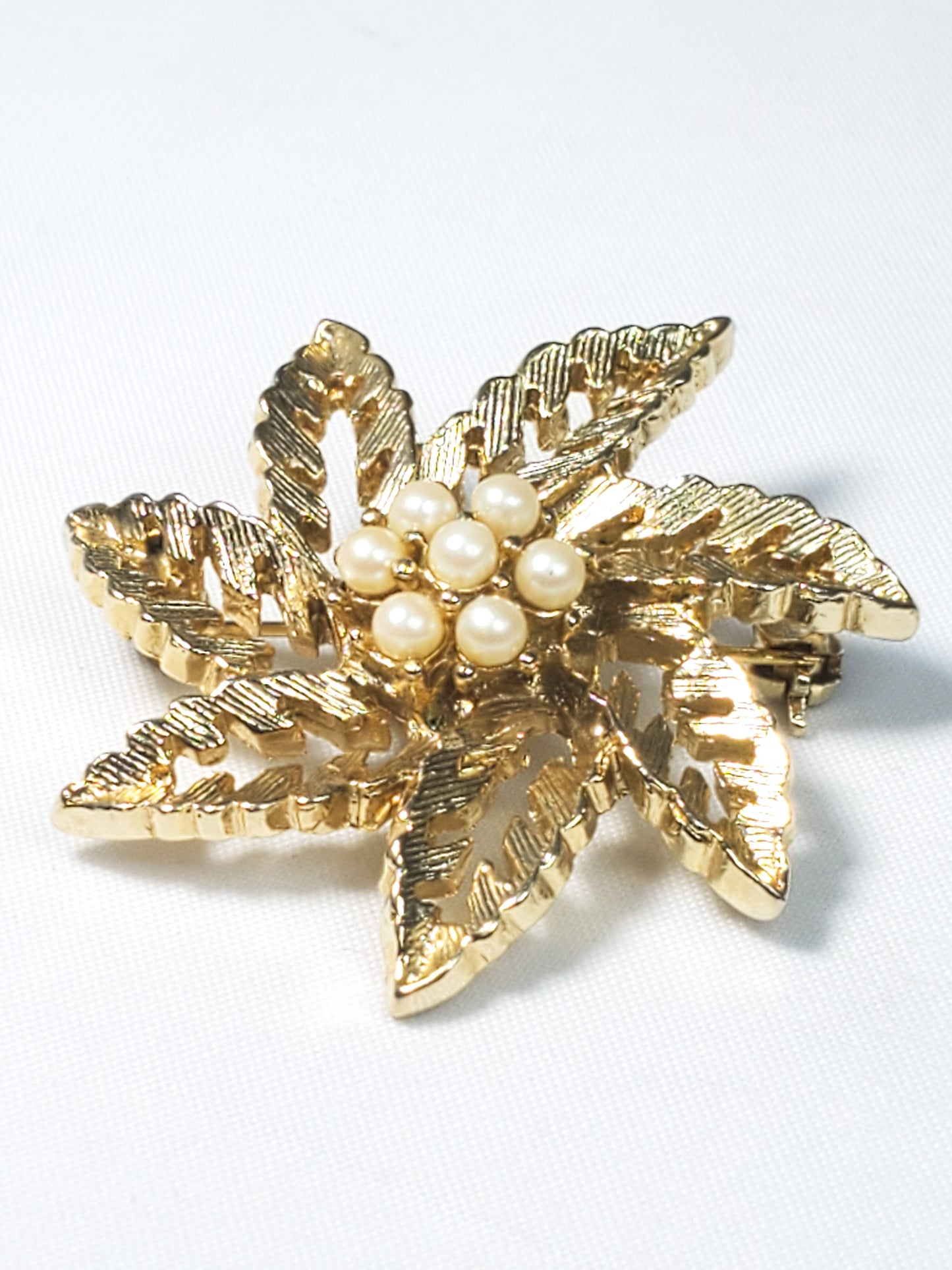 Vintage snowflake style leaf brooch with faux pearl flower accent pin