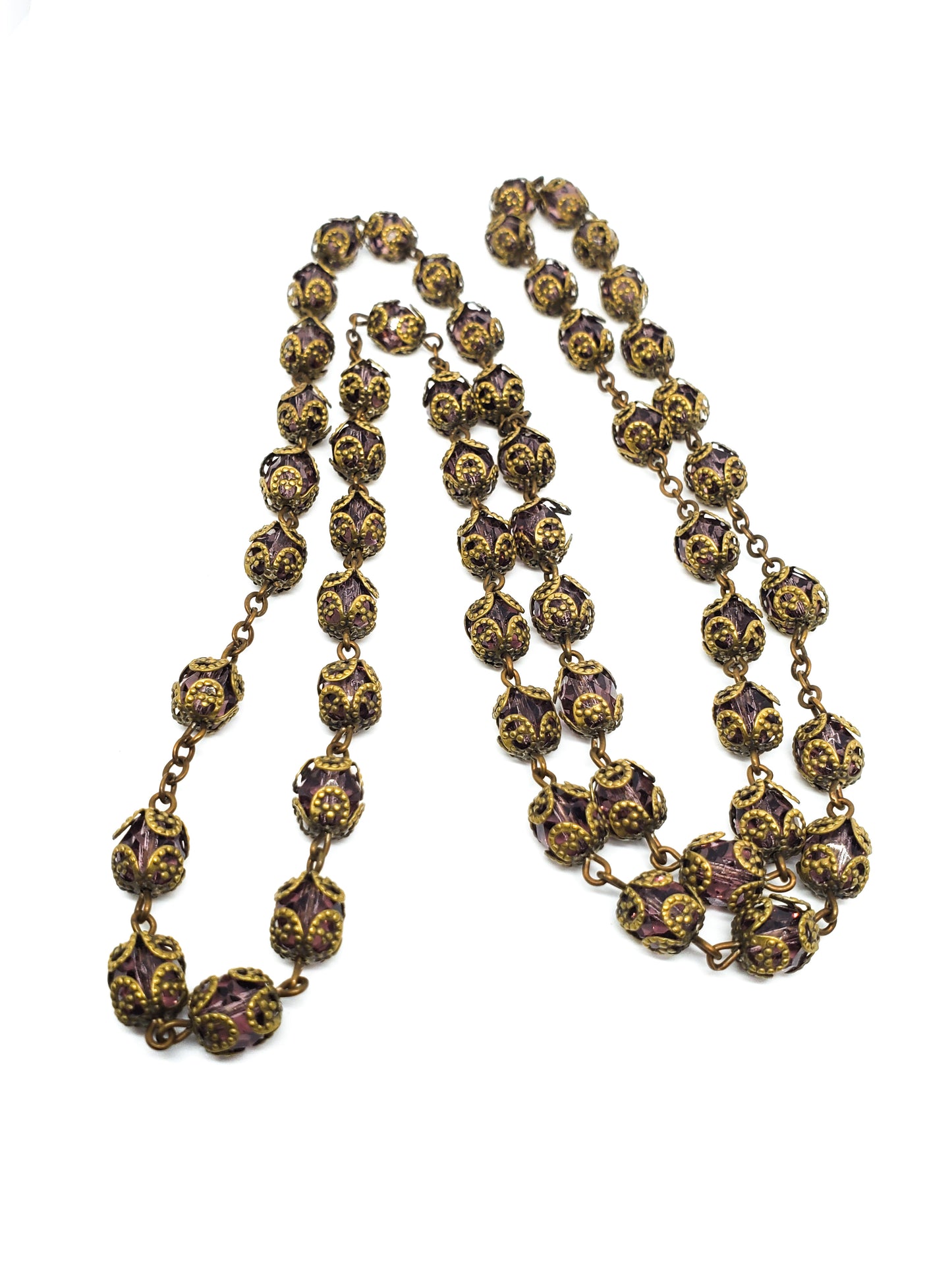 Long Venetian purple faceted glass vintage beaded necklace with brass flower caps